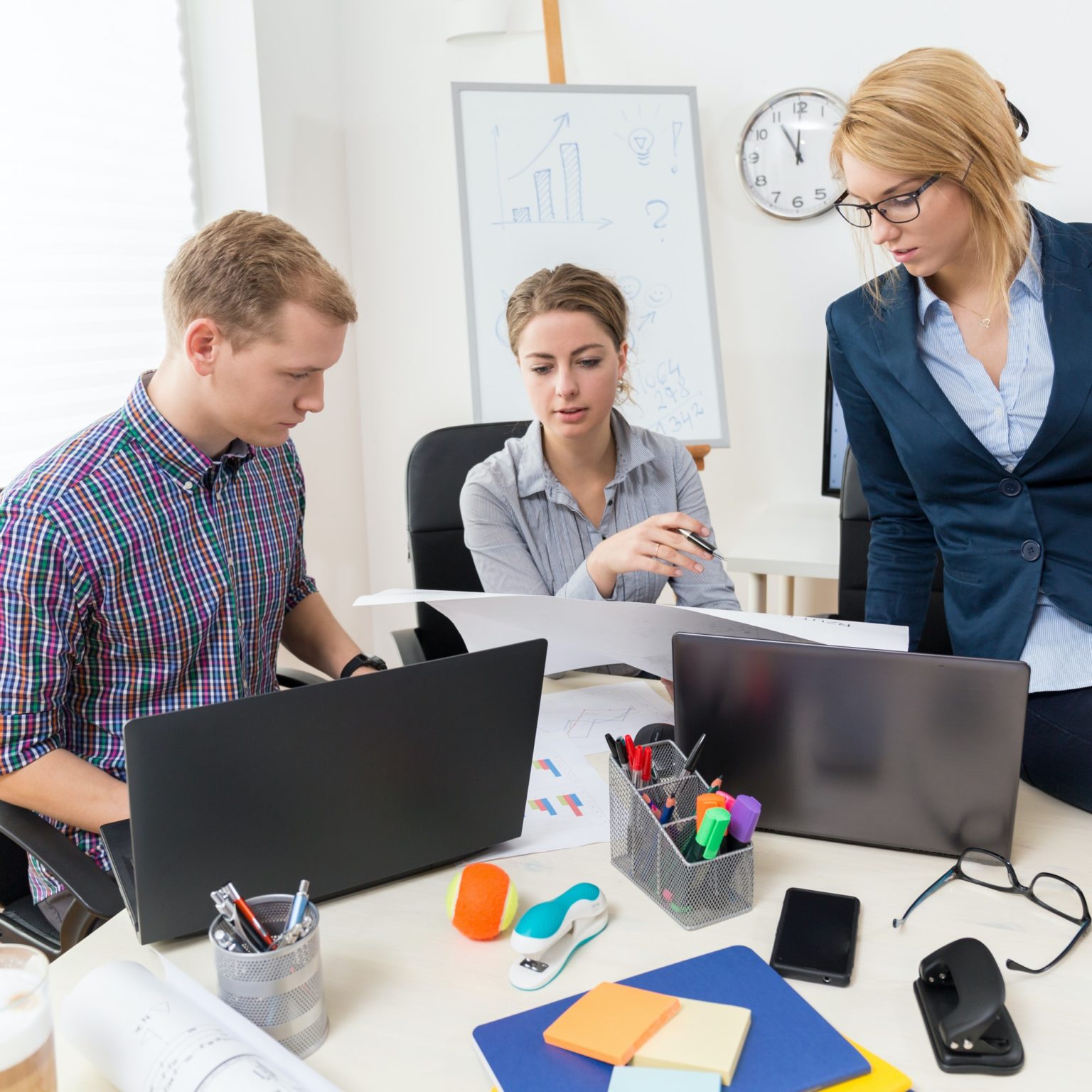 Recruiters collaborating on candidate sourcing